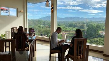 Breakfast, lunch, dinner served; local and international cuisine