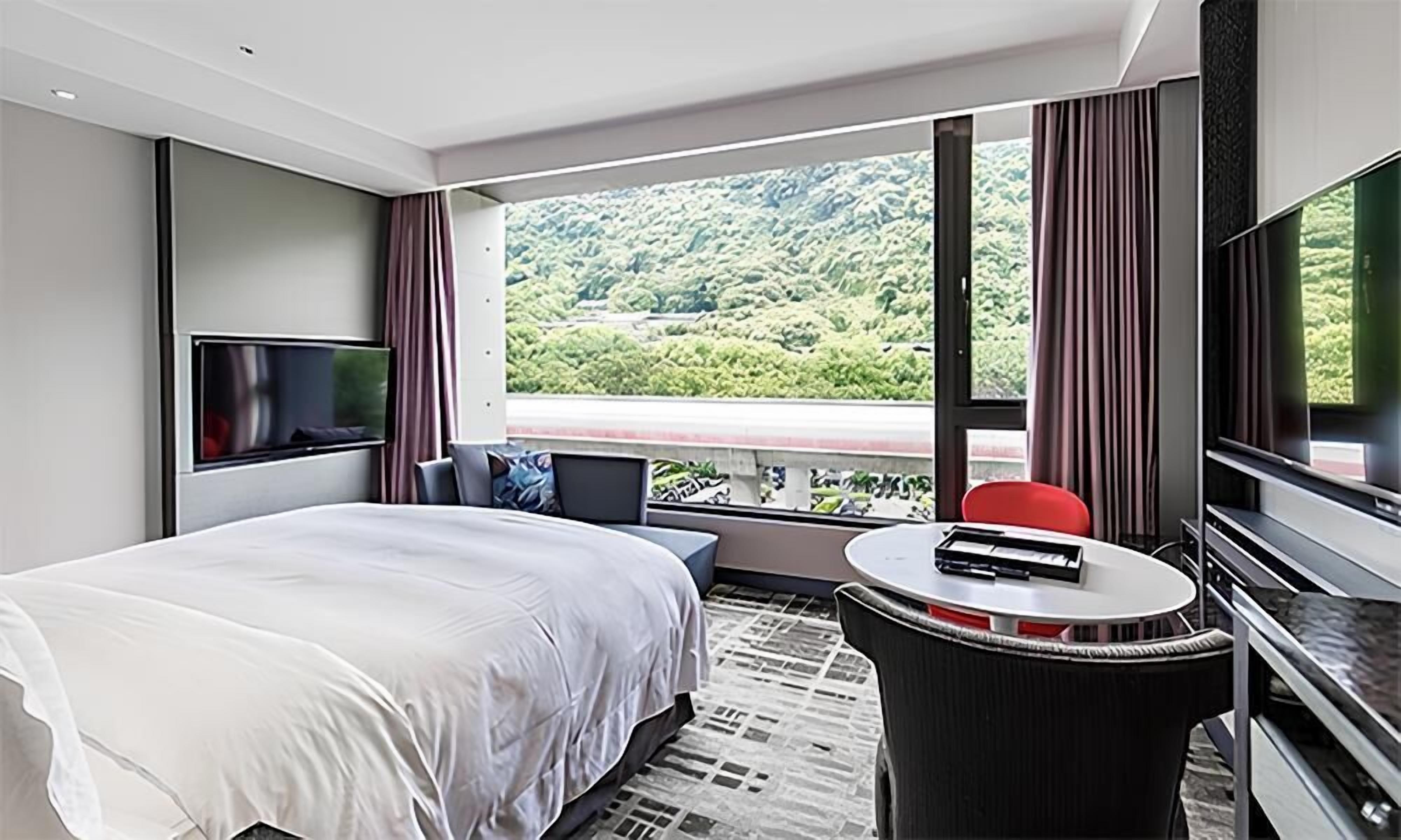 Habitación | Ropa de cama de alta calidad, edredón y minibar 