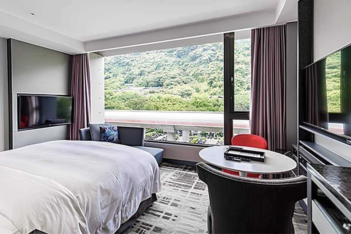 Kamer | Luxe beddengoed, donsdekens, een minibar, een kluis op de kamer