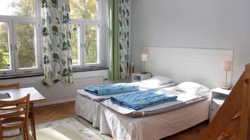 Family Room (Shared bathroom) | Desk, blackout drapes, iron/ironing board, free WiFi