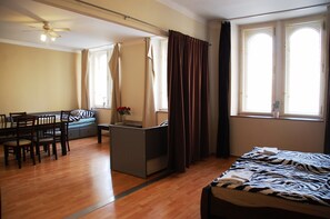 Superior Apartment, Multiple Beds, City View | In-room safe, iron/ironing board, free WiFi, bed sheets