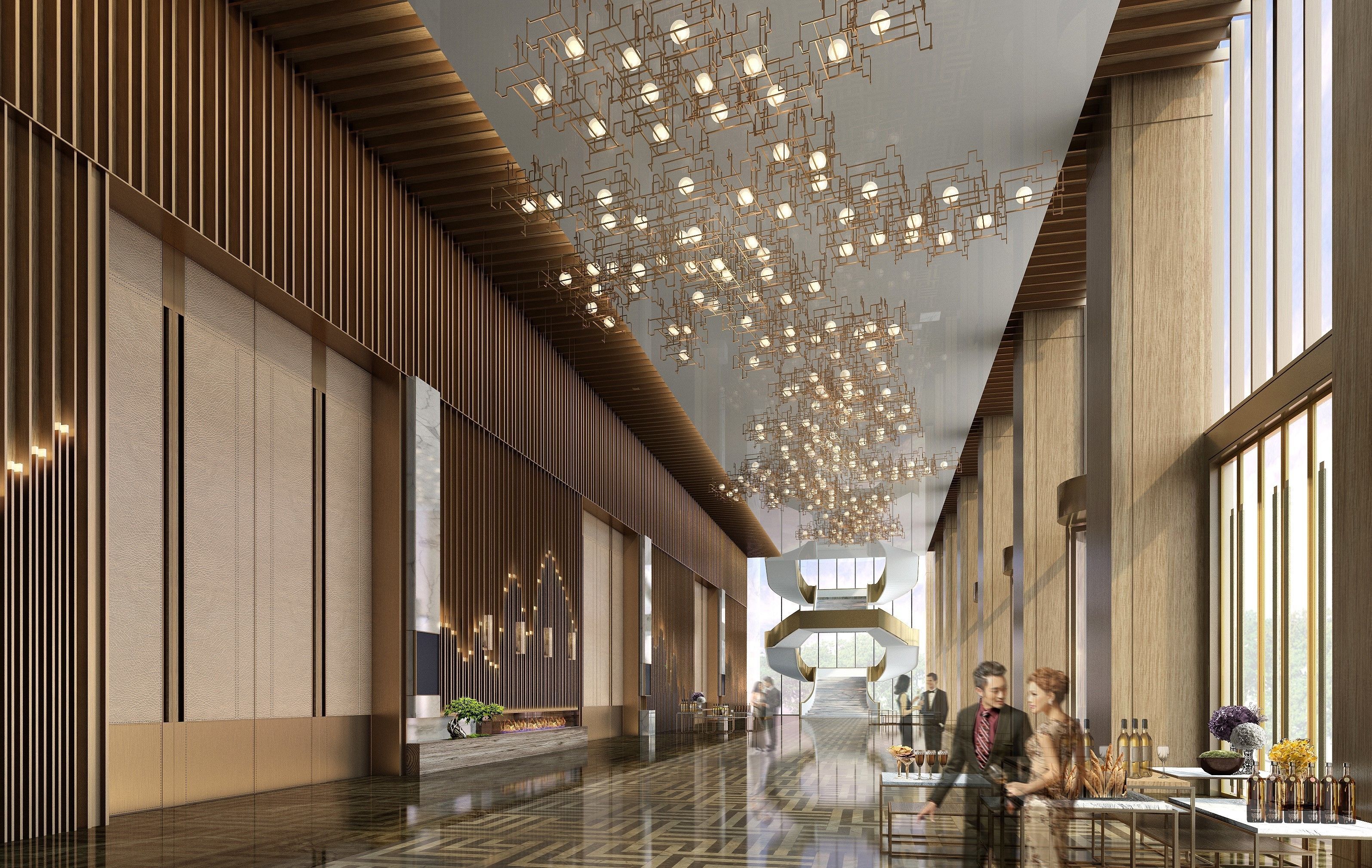 Un hall de hotel espacioso con techo alto, candelabros modernos y una zona de estar central.