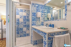 Comfort Quadruple Room, Courtyard Area | Bathroom | Shower, rainfall showerhead, free toiletries, hair dryer