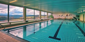 Indoor pool, open 7 AM to 9 PM, pool umbrellas, pool loungers