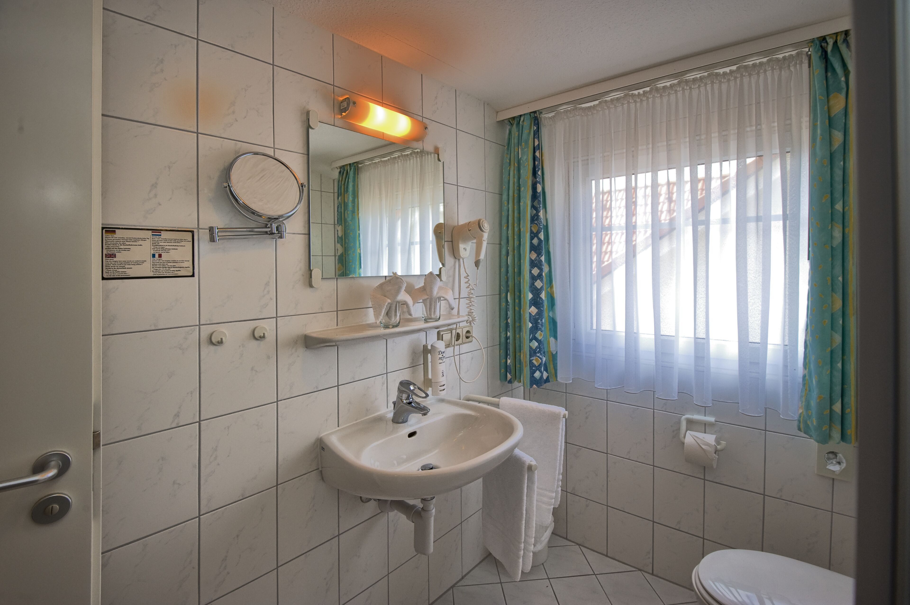superior double room | bathroom | shower, free toiletries, hair dryer, towels