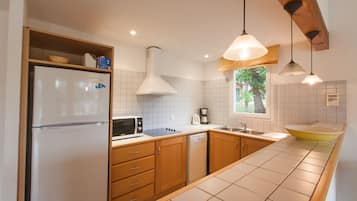 Superior Villa, 3 Bedrooms | Private kitchen | Fridge, microwave, stovetop, coffee/tea maker