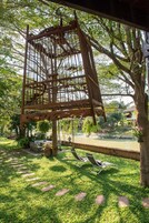 Traditional Thai House River View | Living area | Flat-screen TV