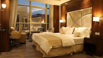 Junior Suite | 1 bedroom, minibar, in-room safe, individually decorated