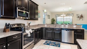 Family Townhome, Hot Tub, Garden Area | Shared kitchen
