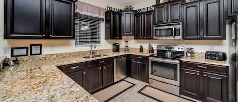 Family Townhome, Hot Tub, Garden Area | Shared kitchen | Fridge, microwave, oven