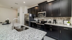 Family Townhome, Private Pool, Garden Area | Shared kitchen | Fridge, microwave, oven