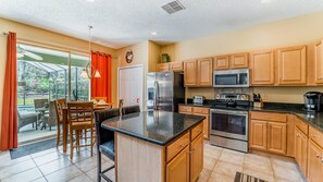 Family Townhome, Hot Tub, Garden Area | Shared kitchen | Fridge, microwave, oven