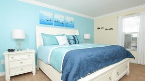 A bedroom with a bed, nightstands, and wall art. - Grhsug8925 - Paradise Palms Resort - 5 Bed 5 Baths House (Kissimmee)