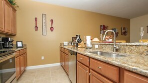 Family Townhome, Private Pool, Garden Area | Private kitchen | Stovetop, dishwasher, cookware/dishes/utensils