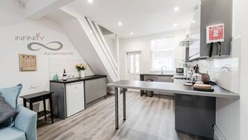 Premium Townhome, Multiple Beds, Non Smoking | Private kitchen | Full-size fridge, microwave, oven, stovetop