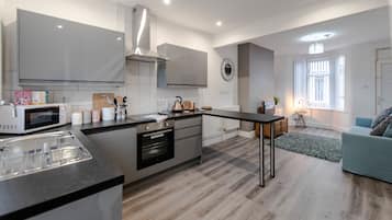 Premium Townhome, Multiple Beds, Non Smoking | Private kitchen | Full-size fridge, microwave, oven, stovetop