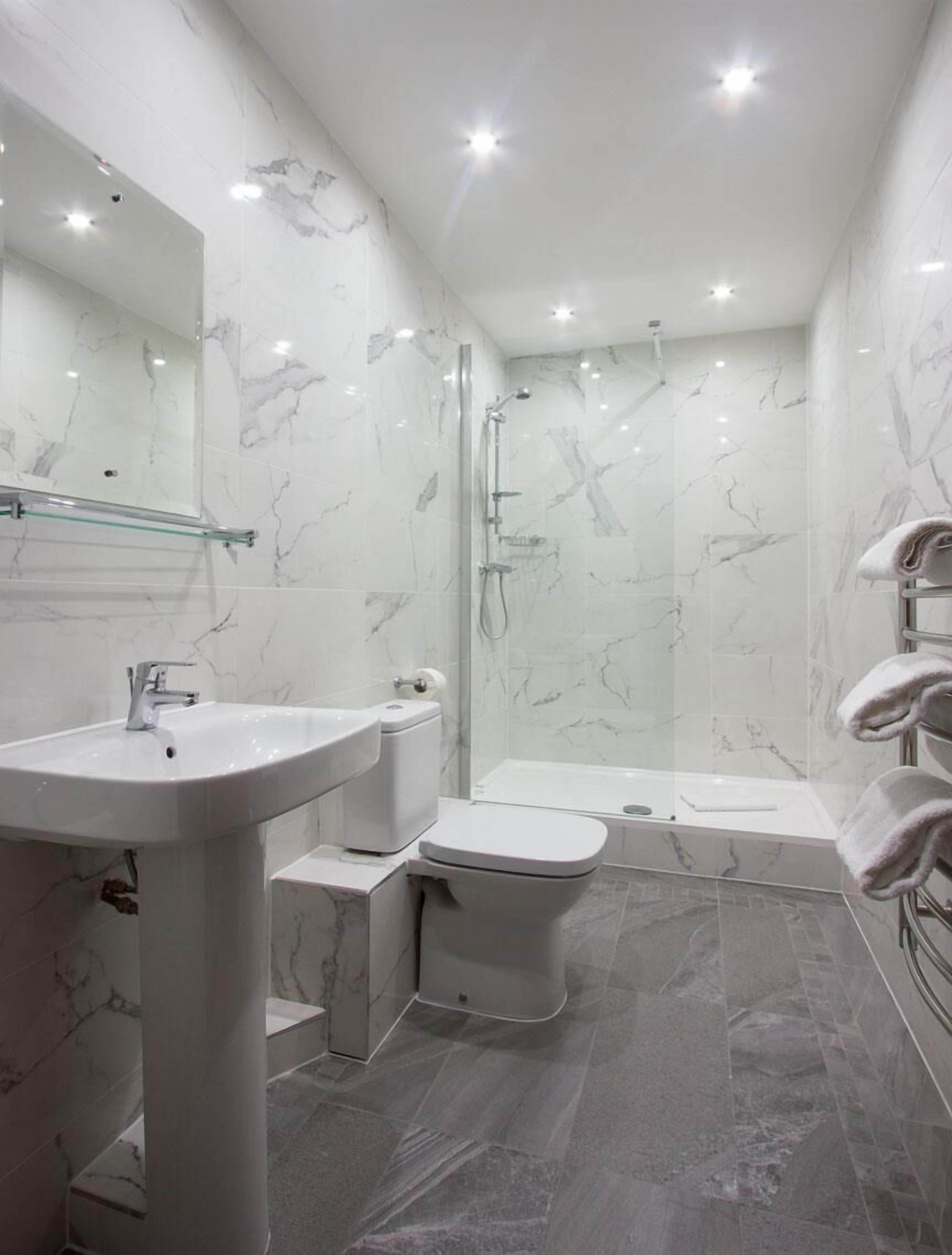 Shower, free toiletries, hair dryer, towels