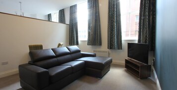 50-inch flat-screen TV with cable channels, TV