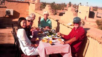 Breakfast, lunch, dinner served; local cuisine