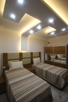 Apartamento ejecutivo | Escritorio, cortinas opacas, sistema de insonorización