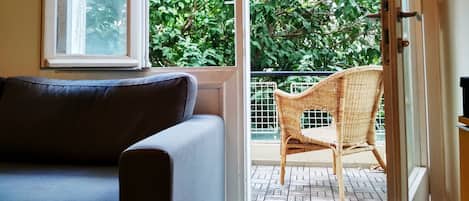 Apartment, 2 Bedrooms | Living room | Flat-screen TV