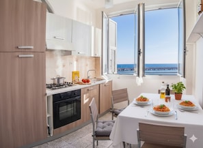 Apartment, 2 Bedrooms, Terrace, Sea View | Private kitchen | Fridge, oven, stovetop, dishwasher - Aria di Mare (Imperia)