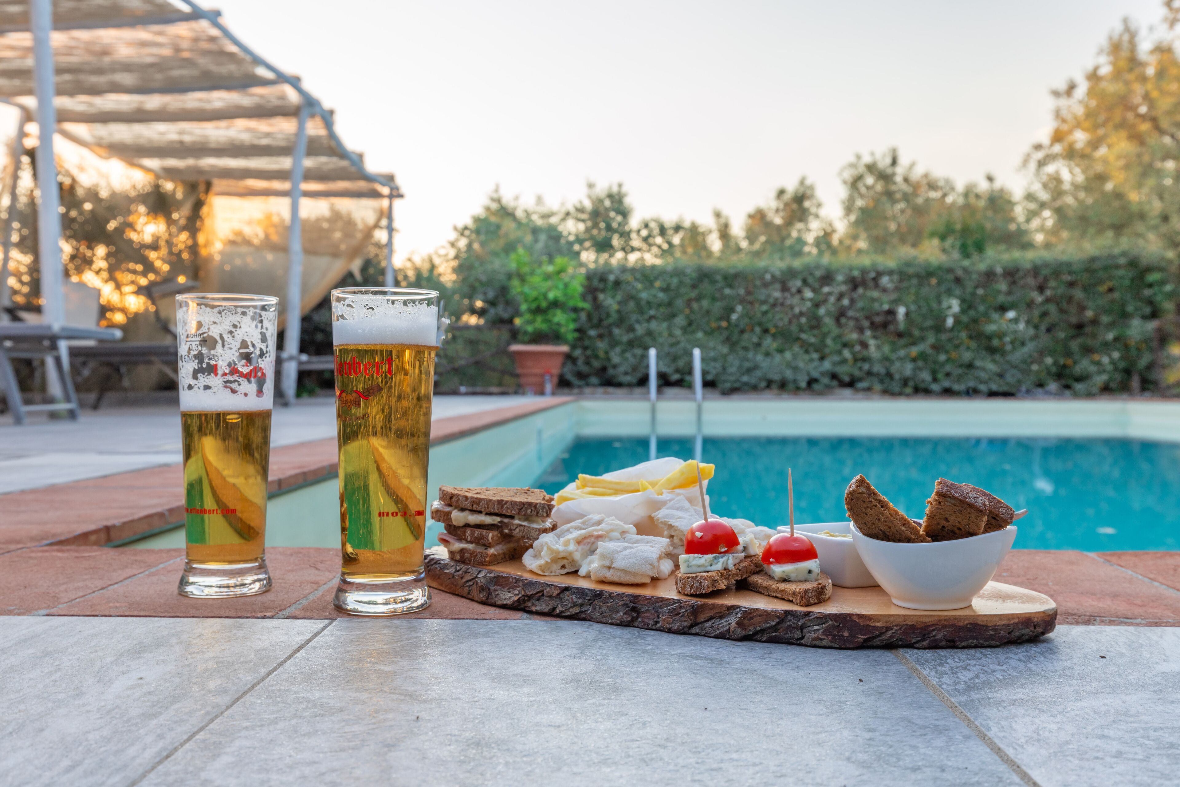 Indoor pool, outdoor pool, pool umbrellas, sun loungers