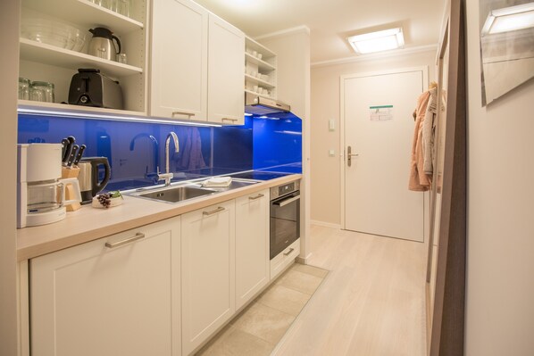 Apartment, 1 Bedroom, Sea Facing | Private kitchen | Fridge, oven, stovetop, dishwasher