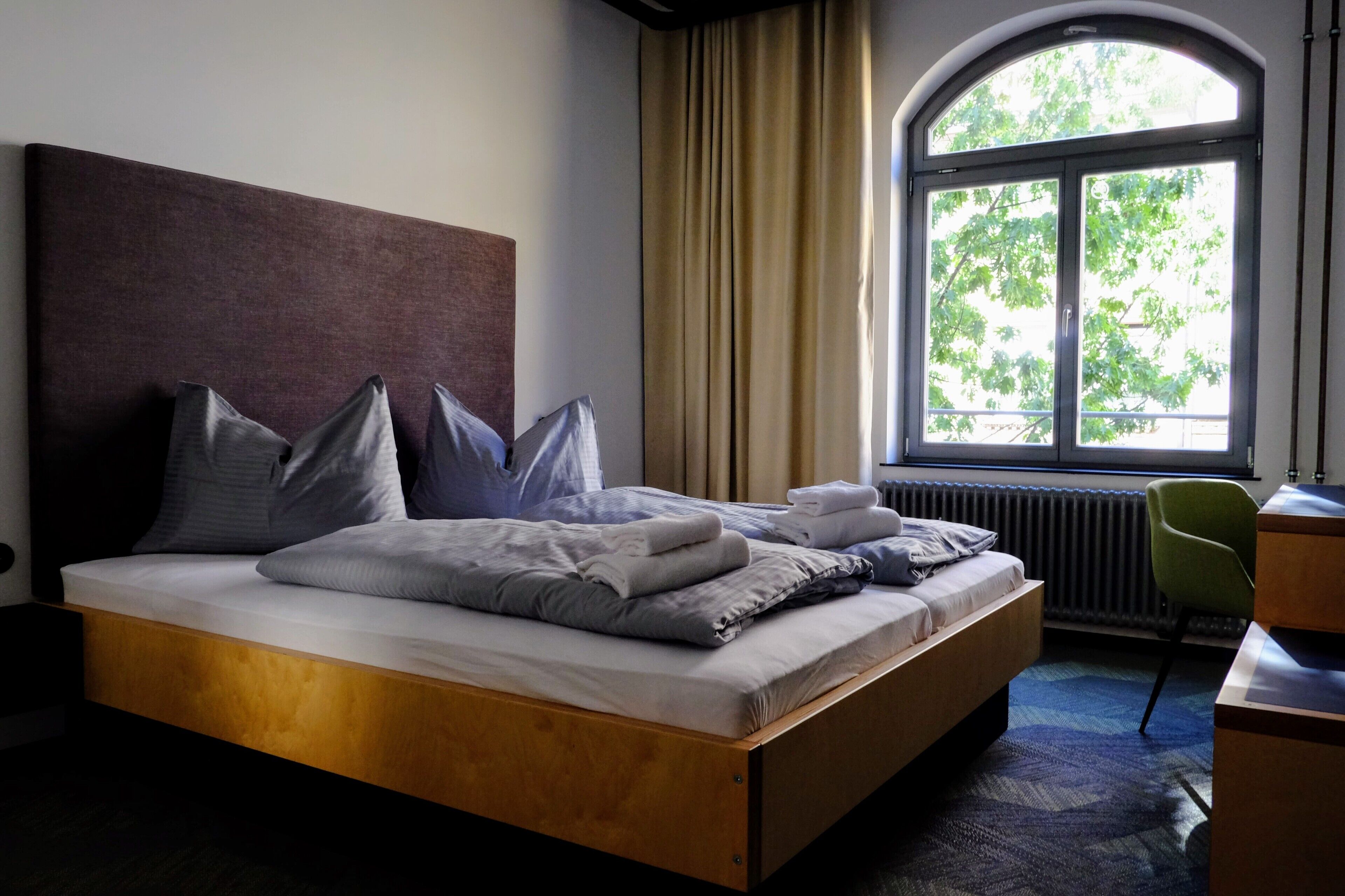 standard apartment | premium bedding, down duvets, desk, blackout curtains