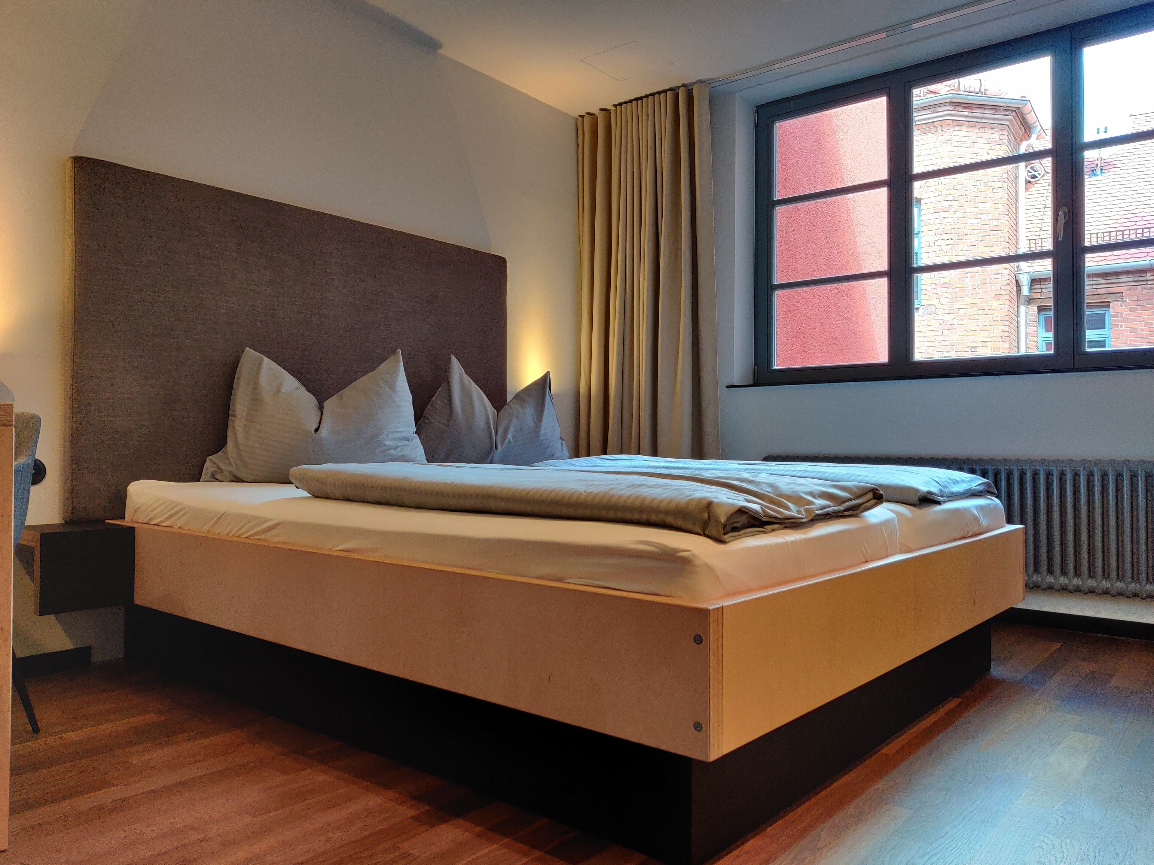 basic double room | premium bedding, down duvets, desk, blackout curtains