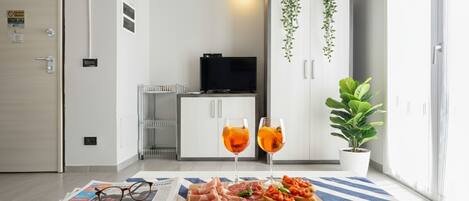 Apartment, 2 Bedrooms (Luna) | Living area | Flat-screen TV