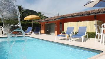 Outdoor pool, pool umbrellas, pool loungers