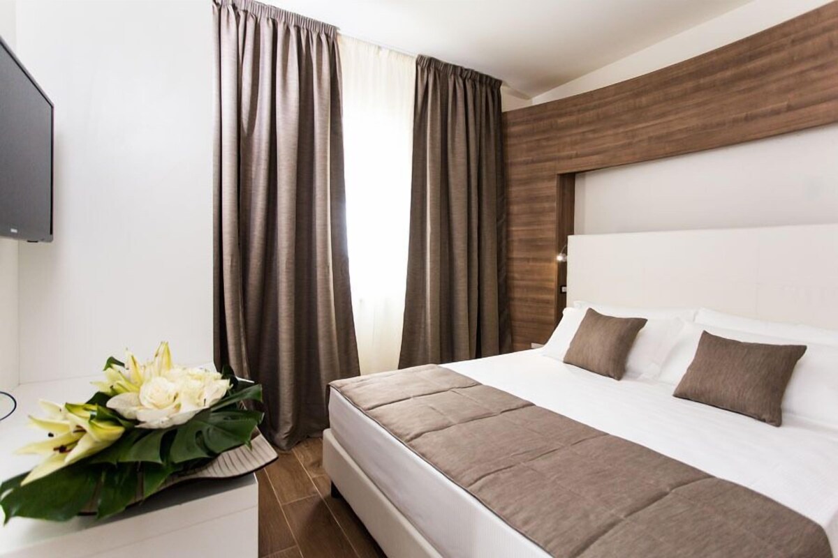 Phòng Suite Deluxe | Phòng cách âm, truy cập Internet không dây miễn phí, bộ trải giường 