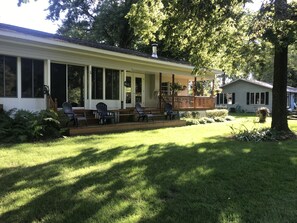 Terrace/patio - Muskegon River Cottage just steps from the river on a low bank.  (Grant)