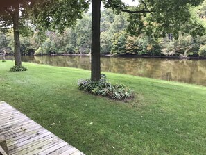 Property grounds - Muskegon River Cottage just steps from the river on a low bank.  (Grant)
