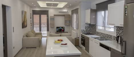 Apartment | Private kitchen | Full-size fridge, oven, stovetop, dishwasher