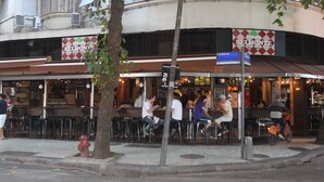 A restaurant with outdoor seating, a fire hydrant, and a sign for 'Bel Monte'. - Make yourself at home in the best spot in Copacabana (the beach block)! (Rio de Janeiro)