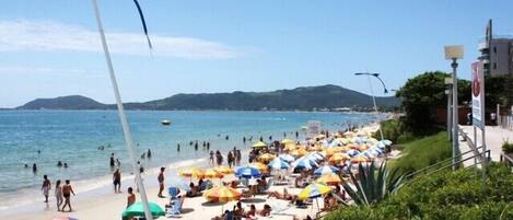 On the beach, sun loungers