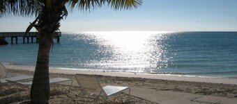 Compelling Canal Home with Pool & Large Dock on each side-Cabana Club Included