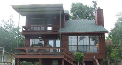 Your vacation home on the lake with its own private covered dock!