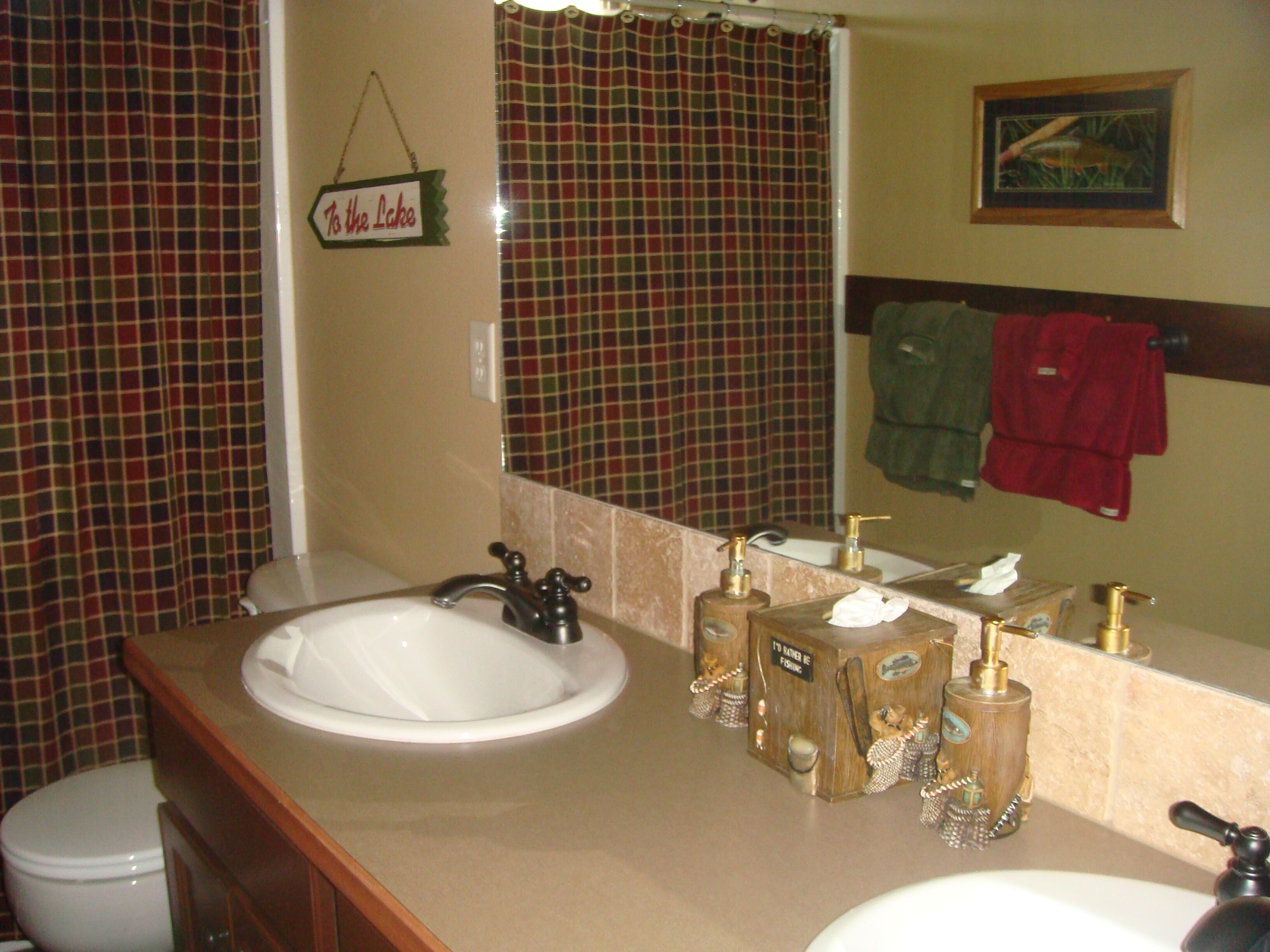 Guest bathroom upstairs with double sinks and shower
