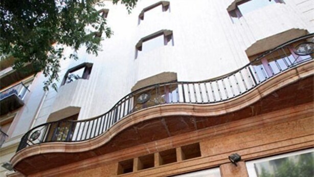 A building with a sign reading "SANT'ANGELO". - Chic and Basic Velvet (Barcelona)