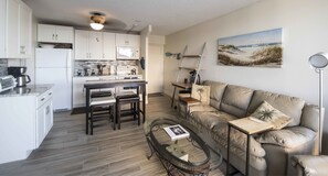 Panoramic Condo, 1 Bedroom, Bay View, Oceanfront (104) | Living area | Flat-screen TV, DVD player - Lovers Key Beach Club by Lovers Key Vacations (Fort Myers Beach)