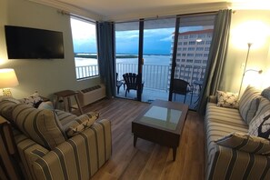 Condo, Pool View, Oceanfront (1104) | Living area | Flat-screen TV, DVD player - Lovers Key Beach Club by Lovers Key Vacations (Fort Myers Beach)