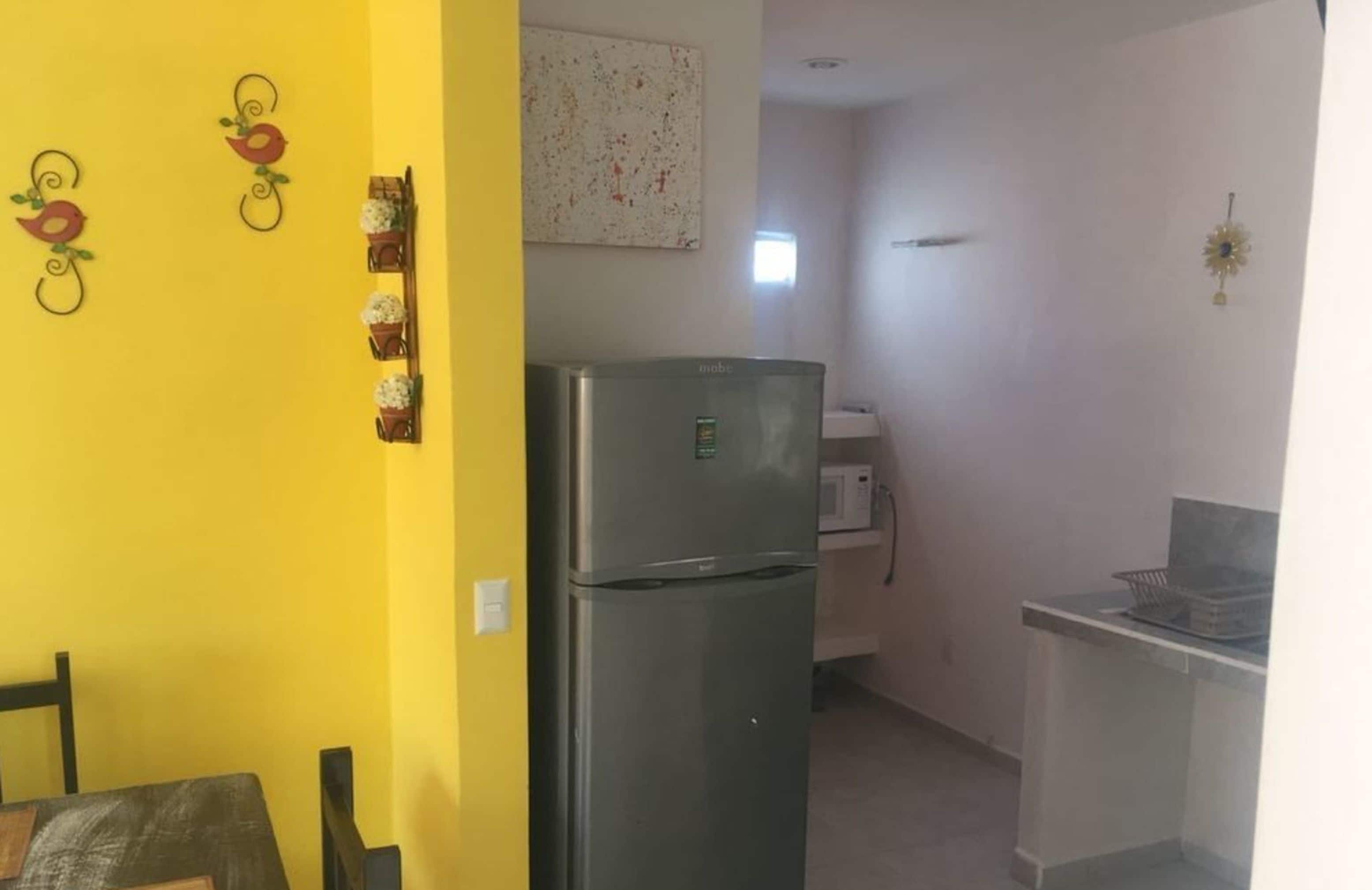 Appartement familial, Plusieurs lits, non-fumeur | Cuisine privée | Réfrigérateur grande capacité avec congélateur, four à micro-ondes