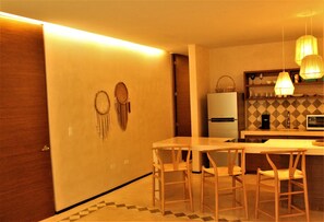 Condo, 1 habitación | Área de sala de estar | Televisión de pantalla plana 