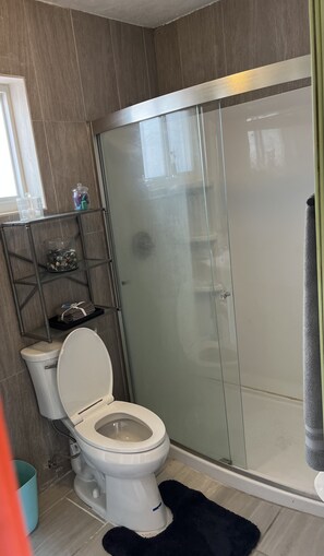 Hair dryer, towels, soap, shampoo