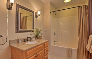 Combined shower/tub, hair dryer, towels, soap