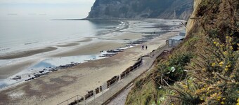 In the heart of the Old Village, 5 minutes to the beach. Sky TV.