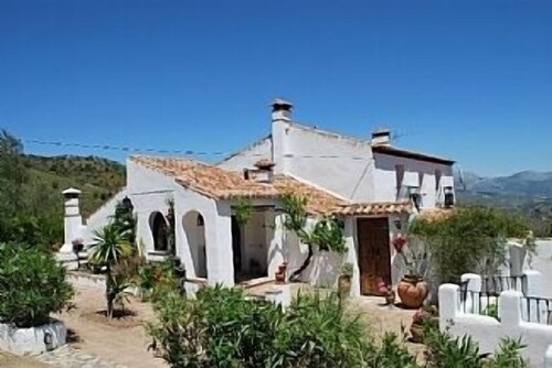 Large Andalucian Farmhouse, stunning views, pool & gardens,close to Natural Park